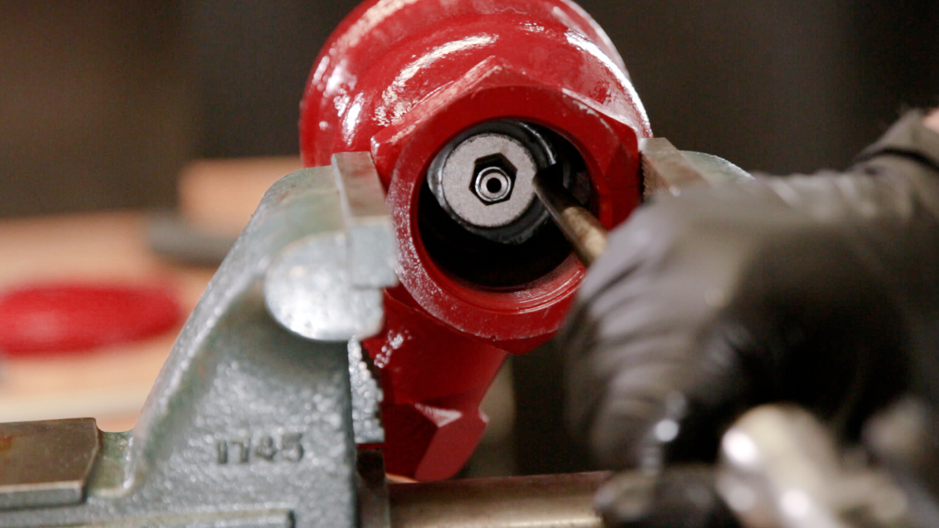 cage assembly removal with punch and hammer